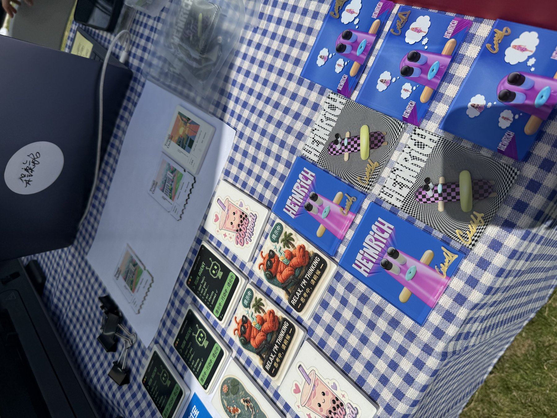 Heinrich merchandise and printed collectibles on display table